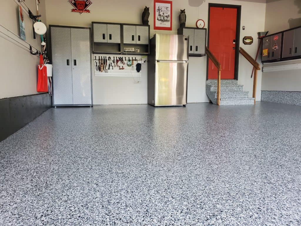 Picture of a garage floor with surfacing work