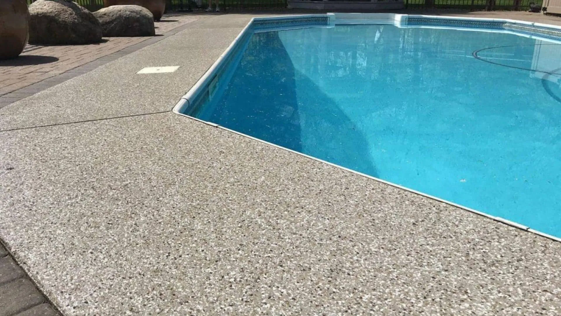 Picture of a pool area floor with surfacing work